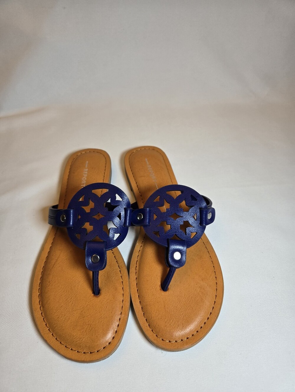 Report Navy Laser Cutout Medallion Leather Thong Sandals
